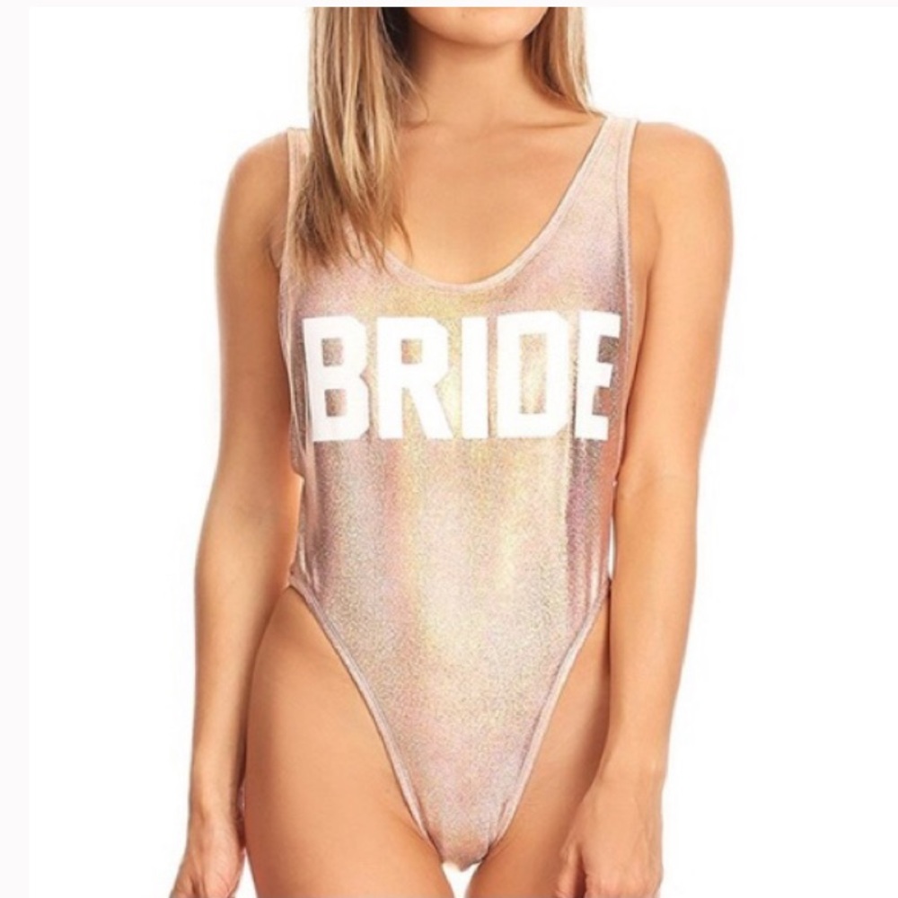 NWT Dippin’ Daisy’s rose gold one piece BRIDE swimsuit  

Size Small